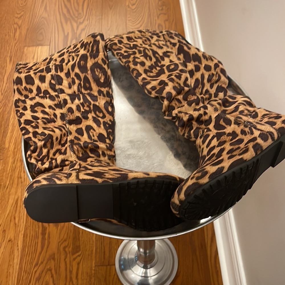 Leopard boots size 6.5 with inside zipper. Brand new!
